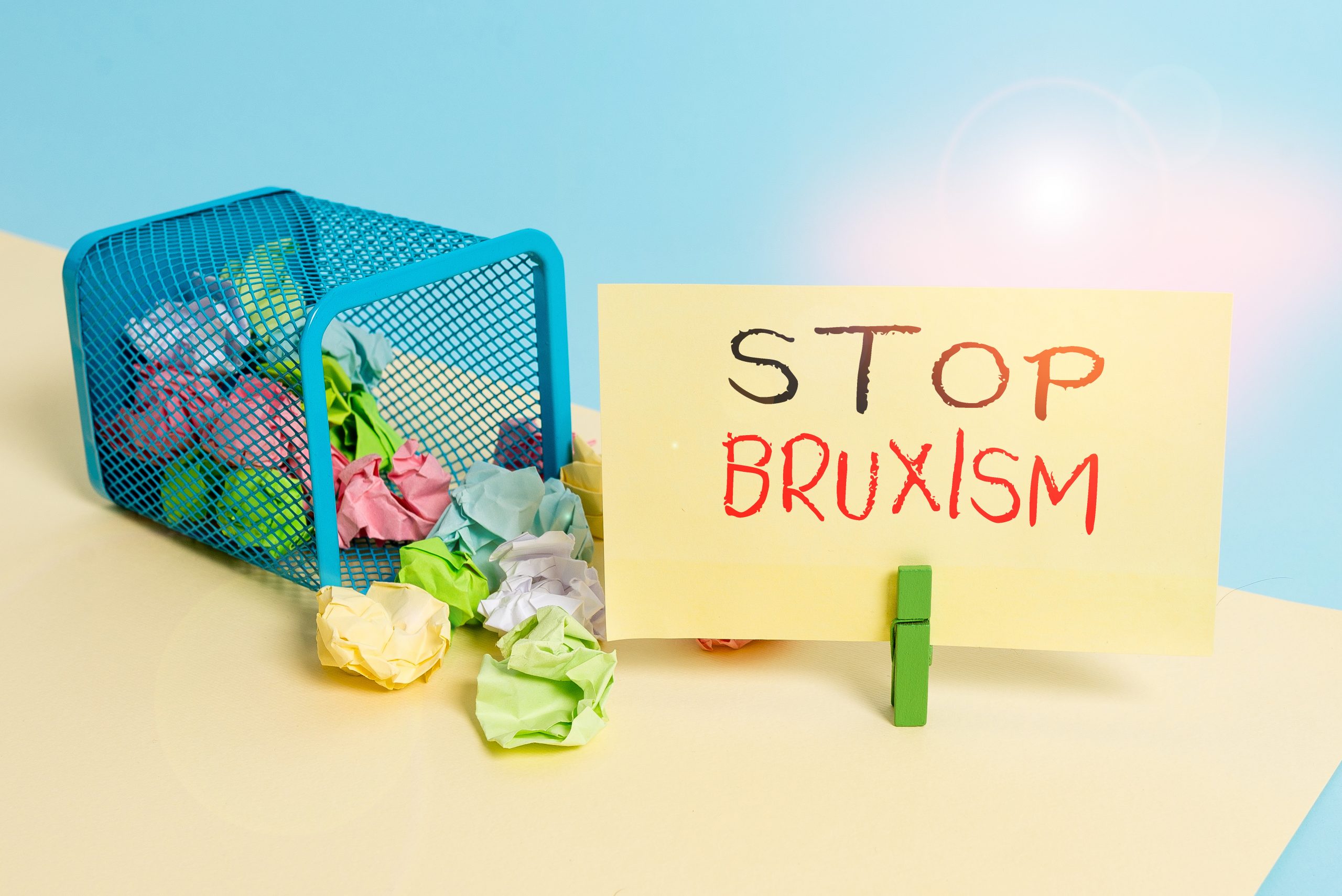 Handwriting text writing Stop Bruxism. Conceptual photo put an end to a condition which you grind or clench the teeth Trash bin crumpled paper clothespin empty reminder office supplies tipped