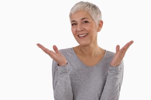 Happy Smiling Mature Woman Portrait on white background. Older skin care, beauty concept.